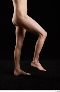 Falco White 1 flexing leg nude side view 0003.jpg